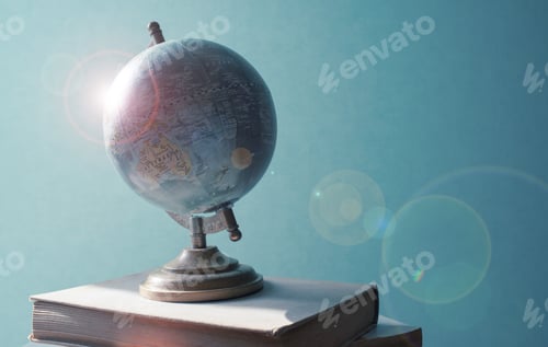 Preview: view of earth globe and books as back to school concept with copy space