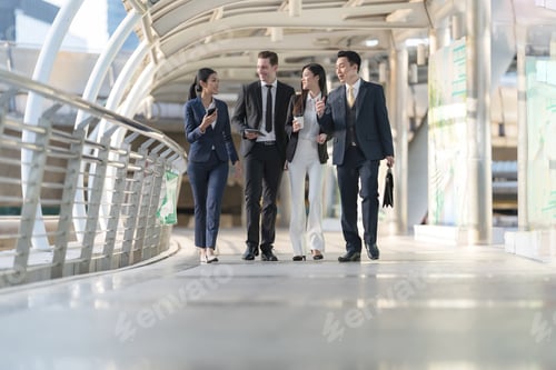 Preview: Business people walking and talk to each other in front of modern office