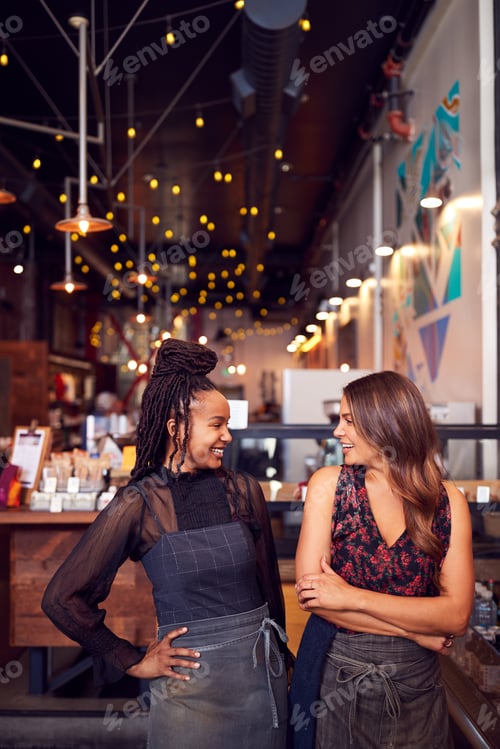 Preview: Two Female Coffee Shop Owners Standing At Sales Desk