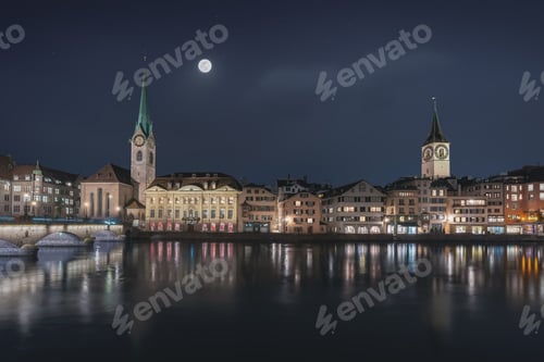 Preview: Zurich Skyline at night with Fraumunster Church and St Peters Church - Zurich, Switzerland