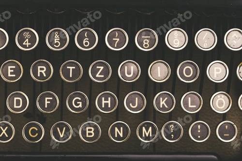 Preview: Vintage type writer machine from 1920s close up to letter keys