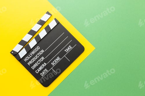 Preview: retro camera clapperboard on a colored background.