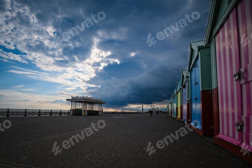 Preview: Dramatic sky over Brighton beach huts
