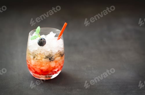 Preview: Blueberry cocktail with ice decorated by mint