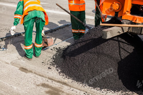 Preview: The man working asphalt pouring tar for road repair