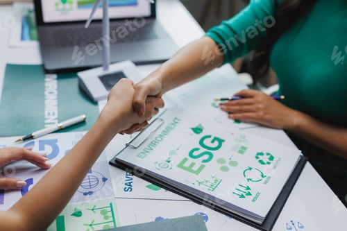 Preview: Businesswomen shaking hands on esg agreement for environmental conservation