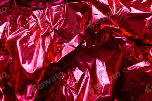 Preview: Abstract red shiny festive background. Crumpled red foil texture. Merry christmas and happy new year