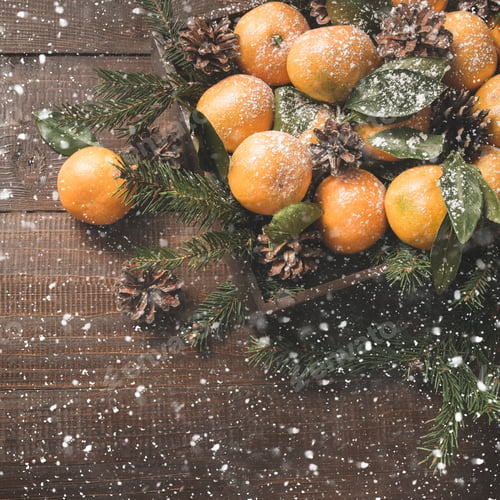 Preview: Fresh mandarins with leaves on wooden board. Christmas composition with copy space.