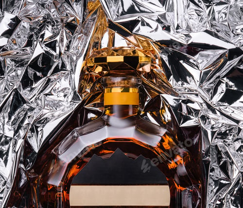 Preview: bottle of cognac in foil top view