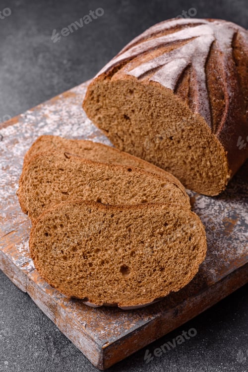 Preview: A loaf of homemade whole grain rye bread for the dinner table. A loaf of rye bread