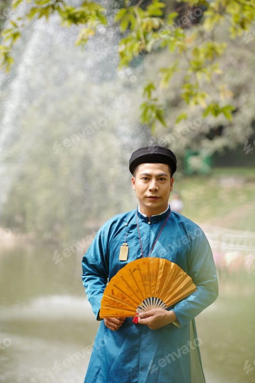 Preview: Handsome man in ao dai dress