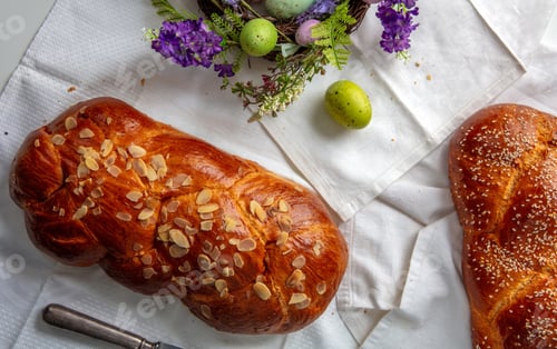 Preview: Easter sweet bread, tsoureki braid and colorful Easter eggs on the table