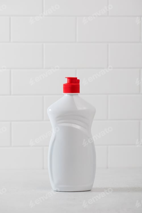 Preview: A mockup of a white plastic bottle with liquid dishwashing detergent with a white tiled background