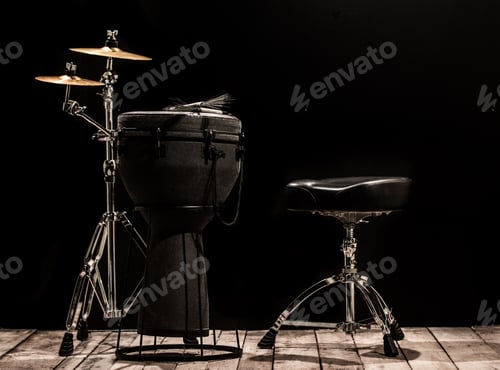 Preview: musical percussion instruments on black background
