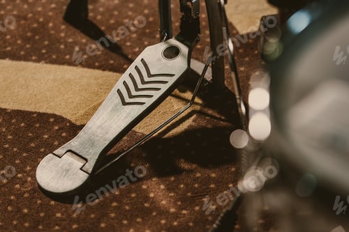 Preview: close-up shot of drum pedal on carpet