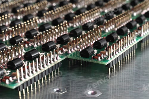 Preview: Close-up side view of a PCB board with SMD components
