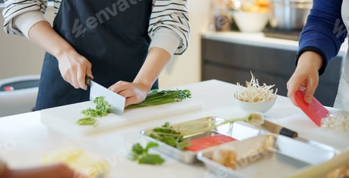 Preview: Chef hands, knife and spring onion for cooking, chopping and prepare ingredients for catering servi