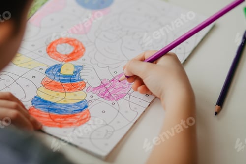 Preview: 5 years old boy preschool draws with a pencil