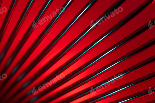 Preview: Closeup of coiled metal spring with sufficiently high strength and elastic properties in neon light