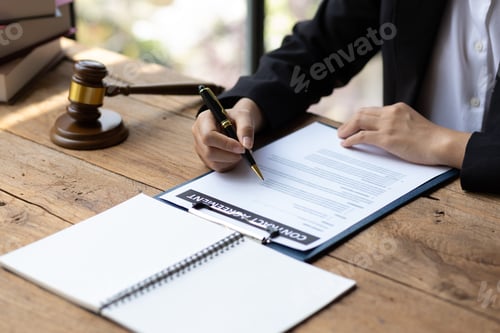 Preview: Lawyer working on paperwork in the office.