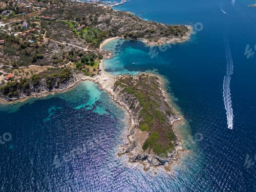 Preview: Aerial view of an island on Sithonia Peninsula, Greece, with beaches and rocks, surrounded by