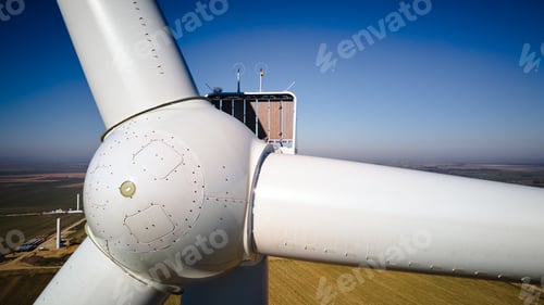 Preview: Aerial view of part of windmill turbine in countryside, Green energy