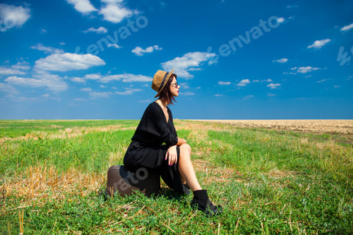 Preview: young woman with suitcase