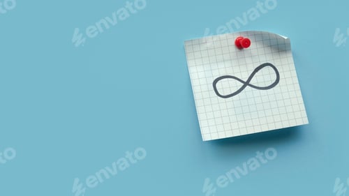 Preview: Infinity sign or symbol handwritten on a memo note over blue background.