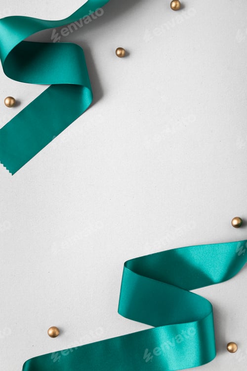 Preview: Green silky ribbon on a gray background