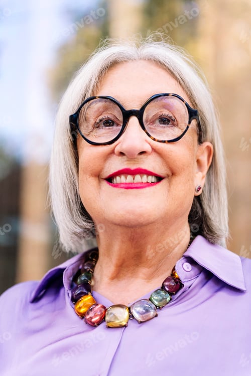 Preview: portrait of a beautiful senior woman smiling happy