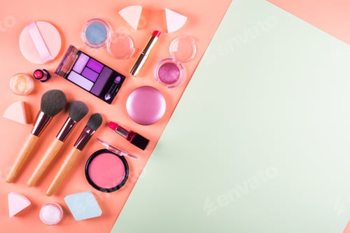 Preview: Make up accessories on orange cantaloupe and mint green background. Beauty products fashion flat lay