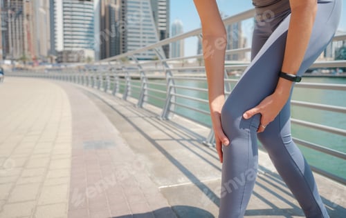 Preview: City Running - asian woman runner and Dubai marina skyline.
