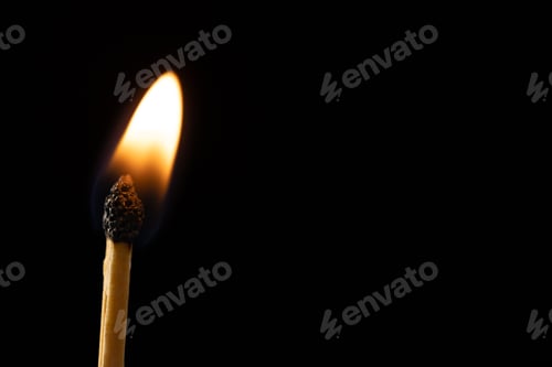 Preview: Close up of lit match with copy space on black background