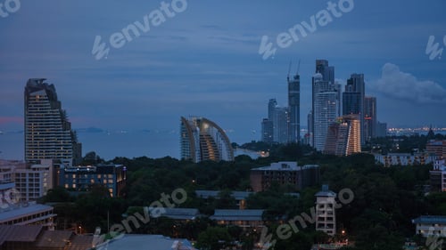 Preview: Pattaya Thailand, a view of the city skyline at night with hotels and skyscrapers buildings