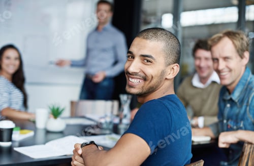 Preview: This room is where success is made. Shot of a group of colleagues in a presentation in a boardroom.