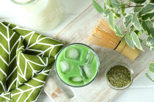 Preview: Matcha latte and accessories for making on white wooden table