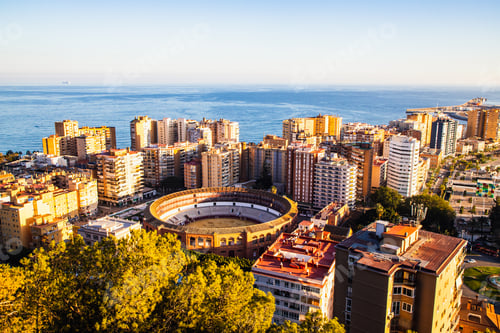 Preview: view over Malaga at sunset travel banner
