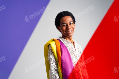 Preview: Fashionable fluid gender man posing in studio