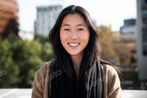 Preview: portrait of a happy young woman outdoor - Close up of a smiling asian girl in the city