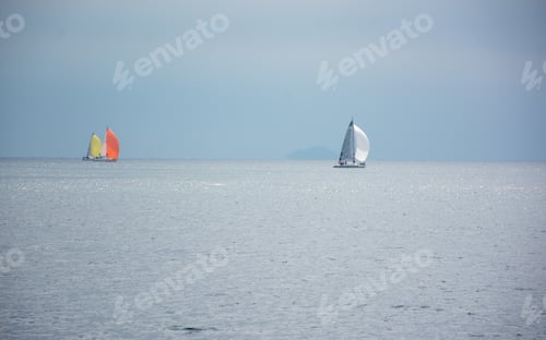 Preview: Wide angle shot of the ships sailing on the water during daytime