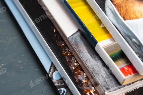 Preview: Close up stacking magazine place on table background