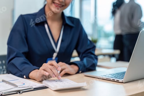 Preview: Accountant woman audit and calculate with financial paperwork at office