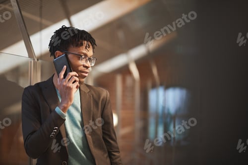 Preview: Businessman talking on the phone