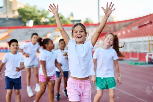 Preview: Children having sport exercise training class outdoors