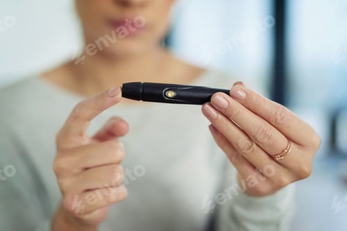 Preview: Closeup shot of an unidentifiable woman testing her sugar level