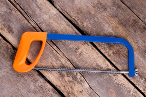Preview: Hand saw on old wooden boards