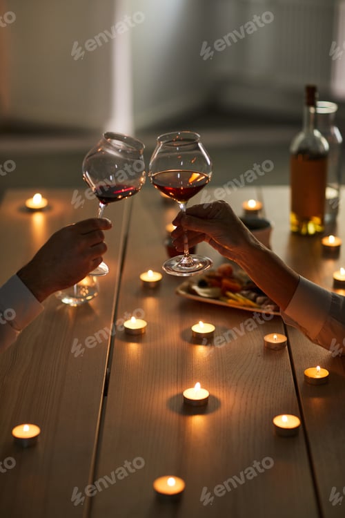Preview: Couple Drinking Wine at Romantic Date