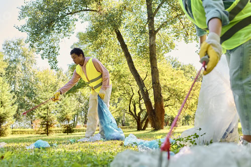 Preview: Serene Couple Engaged in Park Clean-Up