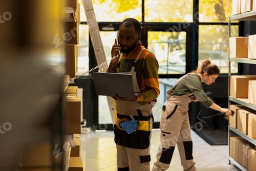 Preview: African american man in a dispatch phone conversation handles custom orders