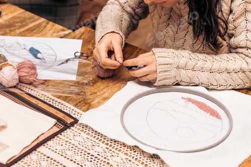 Preview: Punch Needle Workshop. Needlework. Young woman spinning wool